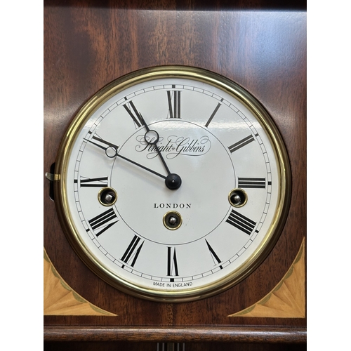 A Knight & Gibbins of London mahogany cased wall clock with