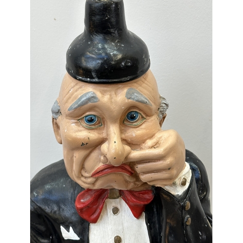 A 'Mr Stinky' hand painted resin novelty butler toilet paper holder ...