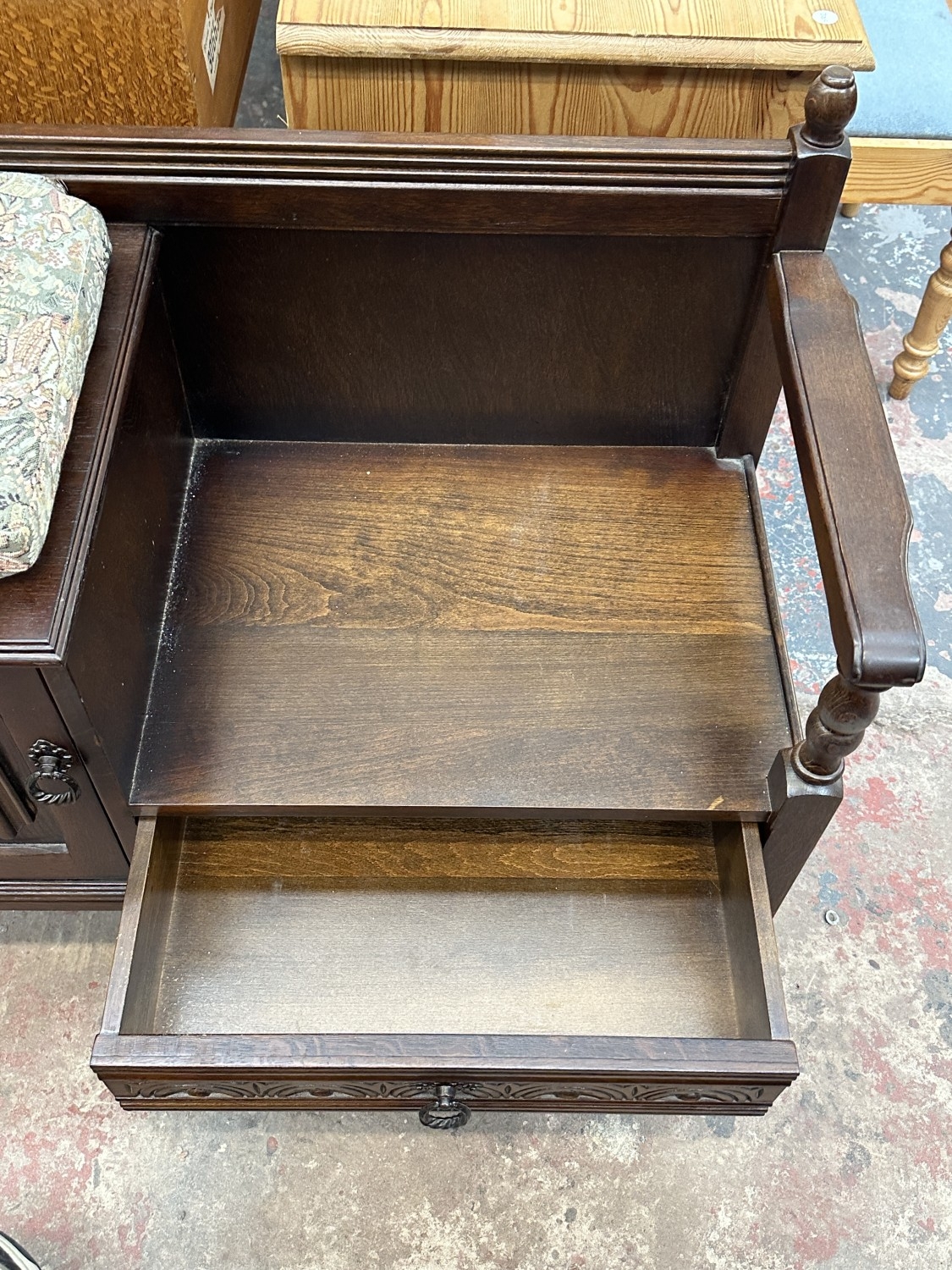 A carved oak linenfold telephone table - approx. 77cm high x 98cm wide ...