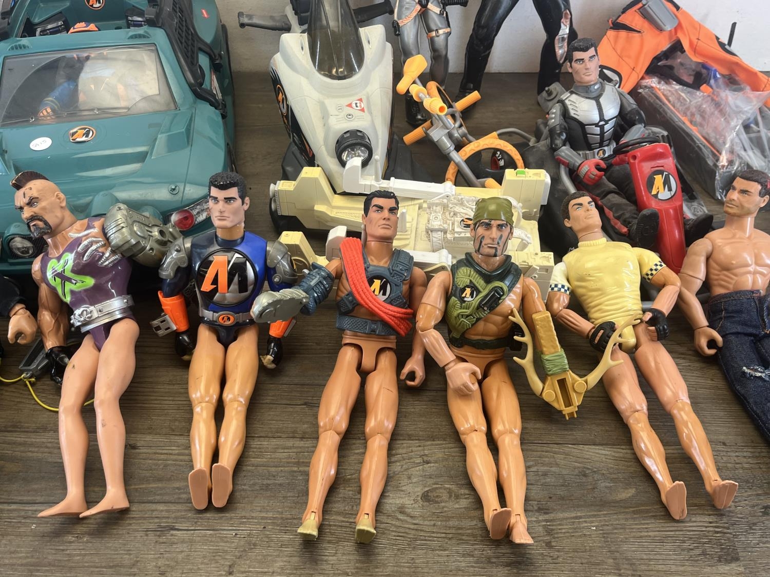 A collection of Action Man toys and accessories to include figurines ...