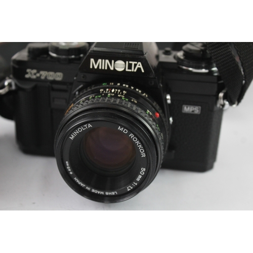 14 - Two 35mm SLR cameras, one Asahi Pentax ME fitted with smc Pentax-M 1:1.7 50mm lens and one Minolta X... 
