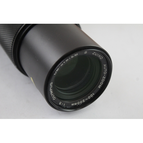 18 - An Olympus OM10 35mm SLR camera fitted with Zuiko Auto-Zoom 1:5 100-200mm lens and Manual Adapter