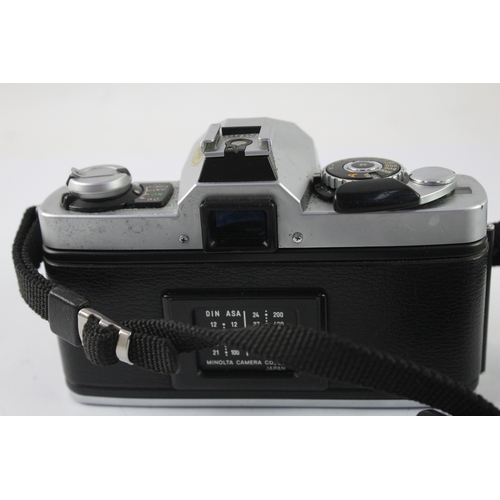 23 - A Minolta XG 9 35mm SLR camera fitted with MD 1:1.7 50mm lens