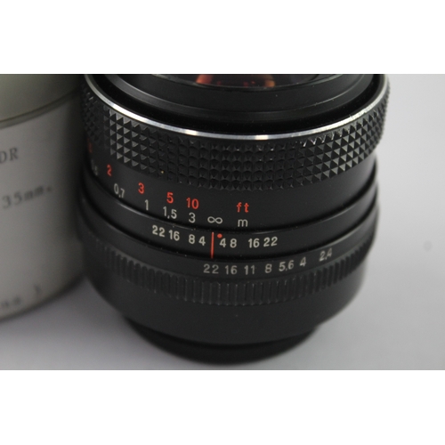 25 - A Carl Zeiss MC Flektogon 1:2.4 35mm M42-mount camera lens with caps