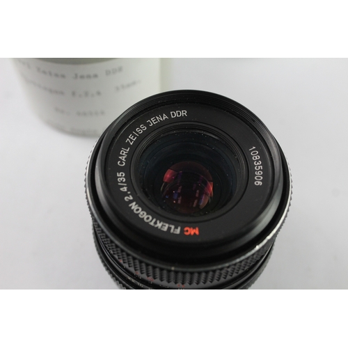 25 - A Carl Zeiss MC Flektogon 1:2.4 35mm M42-mount camera lens with caps