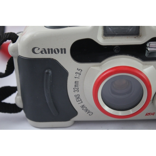 37 - Two compact 35mm cameras, one Olympus XA2 viewfinder fitted with A11 flash and one Canon Sure Shot A... 