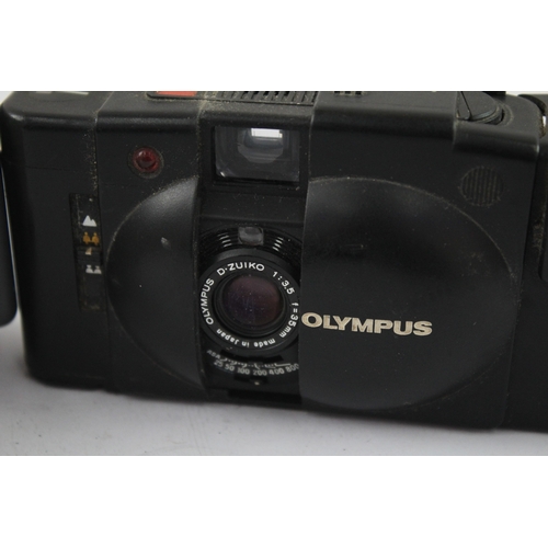 37 - Two compact 35mm cameras, one Olympus XA2 viewfinder fitted with A11 flash and one Canon Sure Shot A... 