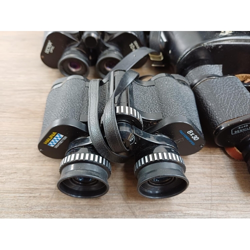 77 - Twelve pairs of binoculars to include cased Swift Belmont 8x30 extra wide field, Docter Optic Dekare... 