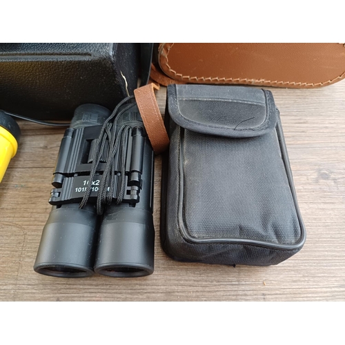 77 - Twelve pairs of binoculars to include cased Swift Belmont 8x30 extra wide field, Docter Optic Dekare... 