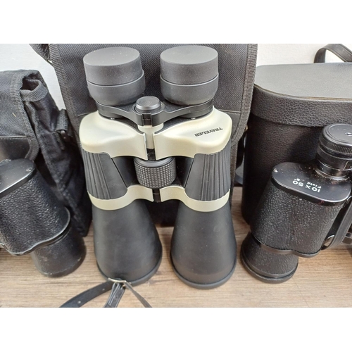 77 - Twelve pairs of binoculars to include cased Swift Belmont 8x30 extra wide field, Docter Optic Dekare... 