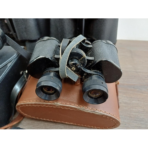 77 - Twelve pairs of binoculars to include cased Swift Belmont 8x30 extra wide field, Docter Optic Dekare... 