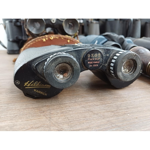 84 - Twelve pairs of binoculars to include cased Optisan Leo-III 8x40, Hilkinson Ultra V 9x35 wide angle,... 