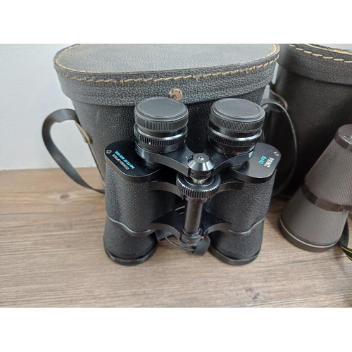 84 - Twelve pairs of binoculars to include cased Optisan Leo-III 8x40, Hilkinson Ultra V 9x35 wide angle,... 