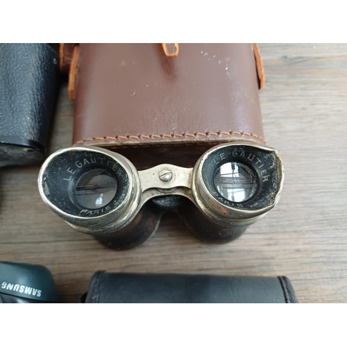 84 - Twelve pairs of binoculars to include cased Optisan Leo-III 8x40, Hilkinson Ultra V 9x35 wide angle,... 
