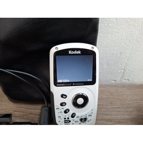 79 - Three digital cameras, one Canon PowerShot SX280 HS 12.1mp BSI-CMOS sensor compact with battery and ... 