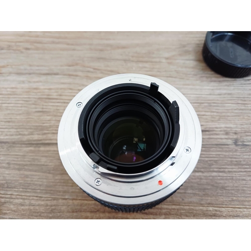 90 - A Carl Zeiss T* Mutar II 2x C/Y-mount teleconverter camera lens with caps