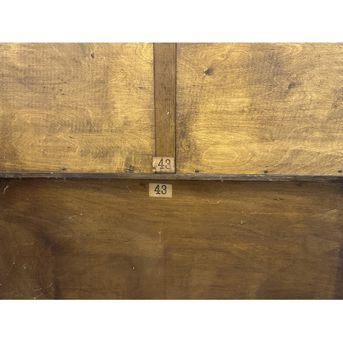21 - A mid 20th century Ercol style oak dresser - approx. 158cm high x 133cm wide x 50cm deep