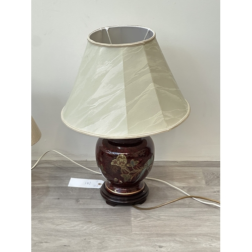 56 - Four ceramic table lamps to include two Chinese hand painted with bird and foliage design - largest ... 