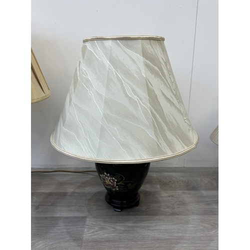 56 - Four ceramic table lamps to include two Chinese hand painted with bird and foliage design - largest ... 