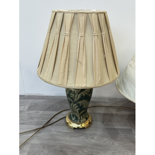 56 - Four ceramic table lamps to include two Chinese hand painted with bird and foliage design - largest ... 