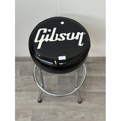 11 - A Gibson guitar swivel stool - approx. 63cm high x 37cm diameter
