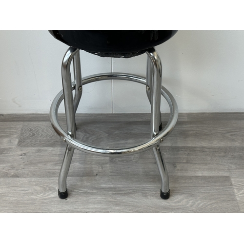 11 - A Gibson guitar swivel stool - approx. 63cm high x 37cm diameter