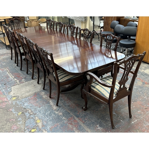 A Georgian style mahogany triple pedestal extending dining table and twelve chairs - approx. 75cm high x 112cm wide x 351cm long when extended