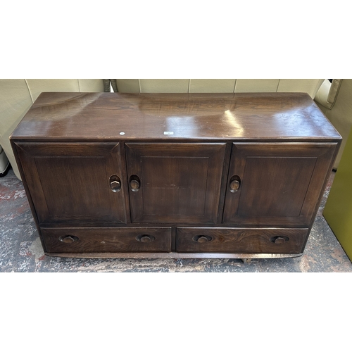16 - An Ercol Model 468 elm sideboard - approx. 76cm high x 128cm wide x 43cm deep
