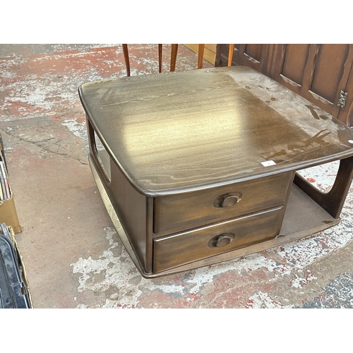 18 - An Ercol elm Pandora coffee table - approx. 40cm high x 79cm wide x 79cm deep