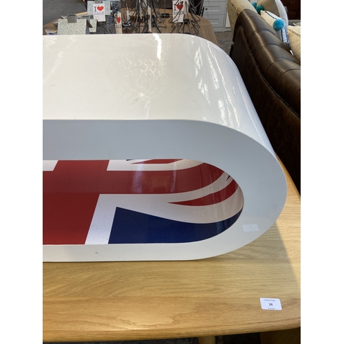 22 - A Zespoke high gloss white hoop coffee table/TV stand with Union Jack design - approx. 36cm high x 9... 