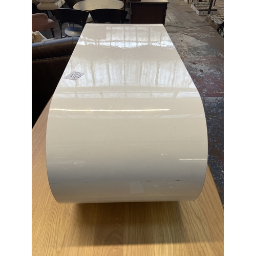 22 - A Zespoke high gloss white hoop coffee table/TV stand with Union Jack design - approx. 36cm high x 9... 