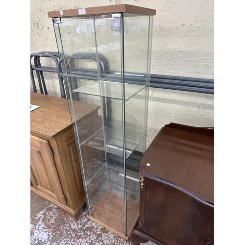 3 - A modern beech effect and glass display cabinet with three glass shelves - approx. 163cm high x 42.5... 