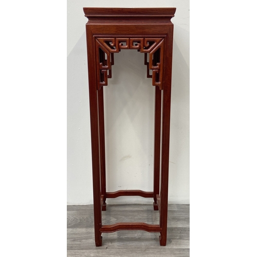 42 - A Chinese carved hardwood jardinière stand - approx. 91cm high x 30cm wide x 30cm deep