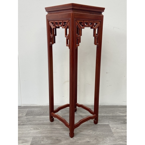 42 - A Chinese carved hardwood jardinière stand - approx. 91cm high x 30cm wide x 30cm deep
