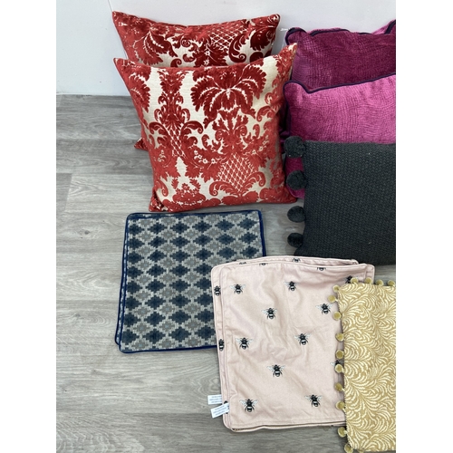 43 - Fourteen modern fabric cushions and covers, six covers and eight cushions