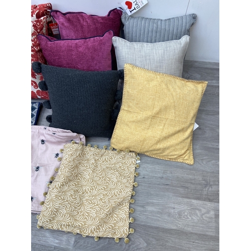 43 - Fourteen modern fabric cushions and covers, six covers and eight cushions