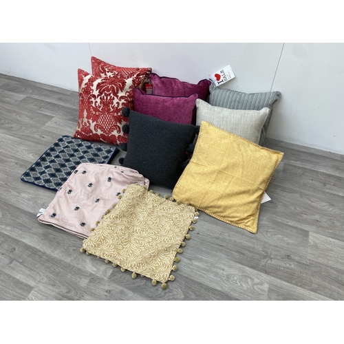 43 - Fourteen modern fabric cushions and covers, six covers and eight cushions