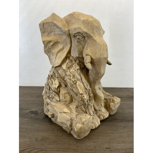 47 - A modern resin driftwood effect elephant statue - approx. 47cm high