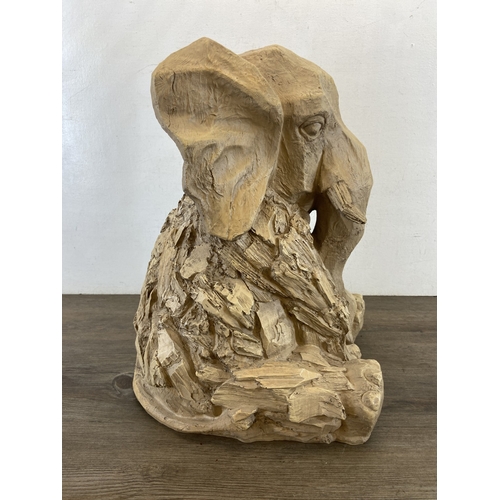 47 - A modern resin driftwood effect elephant statue - approx. 47cm high