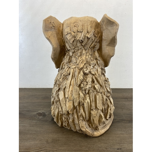 47 - A modern resin driftwood effect elephant statue - approx. 47cm high