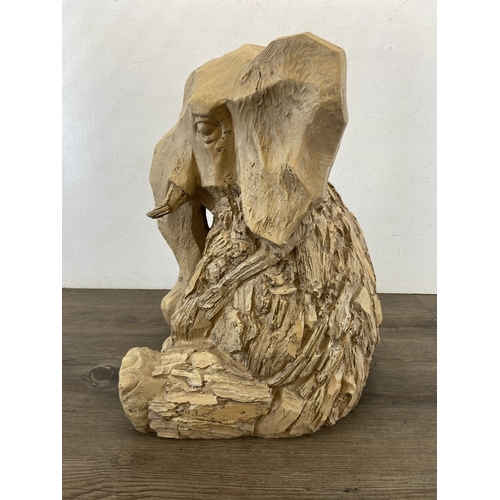 47 - A modern resin driftwood effect elephant statue - approx. 47cm high