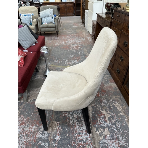 48 - A Harveys walnut effect and glass top Piston dining table and four beige buttoned fabric upholstered... 