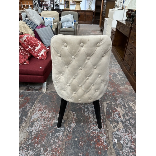 48 - A Harveys walnut effect and glass top Piston dining table and four beige buttoned fabric upholstered... 