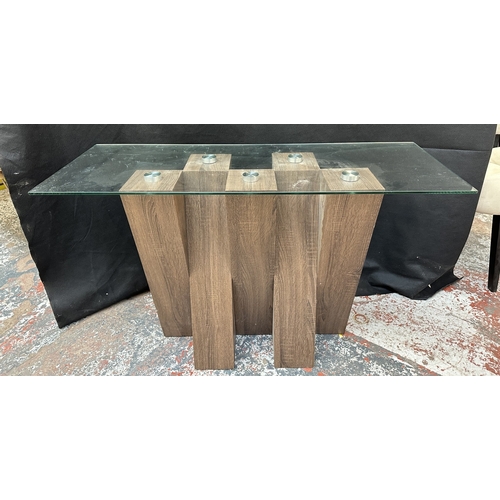 49 - Two Harveys walnut effect and glass top Piston occasional tables, one console - approx. 76cm high x ... 