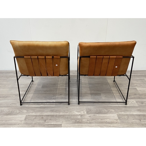 50 - A pair of Nkuku Durium style aged tan leather and iron lounger armchairs - approx. 80cm high x 59cm ... 
