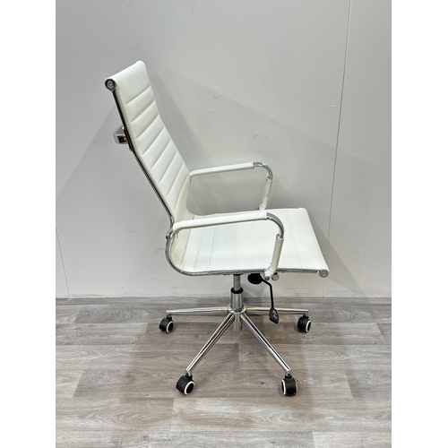 53 - A modern white leatherette and chrome plated swivel desk chair - approx. 109cm high x 56cm wide x 54... 