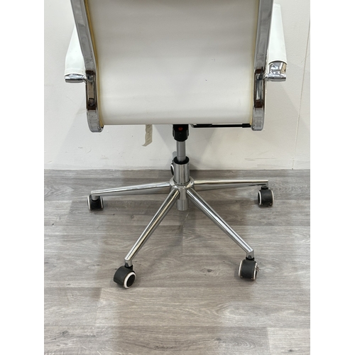 53 - A modern white leatherette and chrome plated swivel desk chair - approx. 109cm high x 56cm wide x 54... 