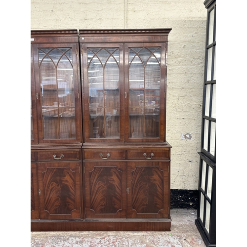 7 - A Georgian style mahogany glazed three section bookcase - approx. 205cm high x 278cm wide x 38cm dee... 