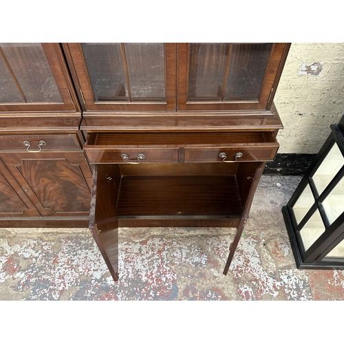 7 - A Georgian style mahogany glazed three section bookcase - approx. 205cm high x 278cm wide x 38cm dee... 