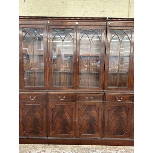 7 - A Georgian style mahogany glazed three section bookcase - approx. 205cm high x 278cm wide x 38cm dee... 